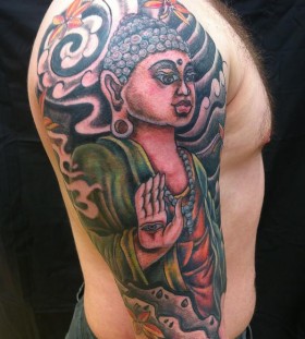 Coloured buddha arm tattoo