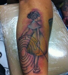 Coloured girl and maze tattoo
