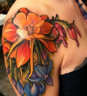 Colourful flowers shoulder tattoo by Amanda Leadman