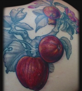 Cool apple branch tattoo