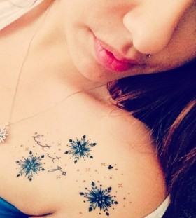 Cool snowflakes collarbone tattoo
