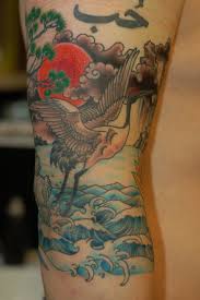 Crane and water tattoo