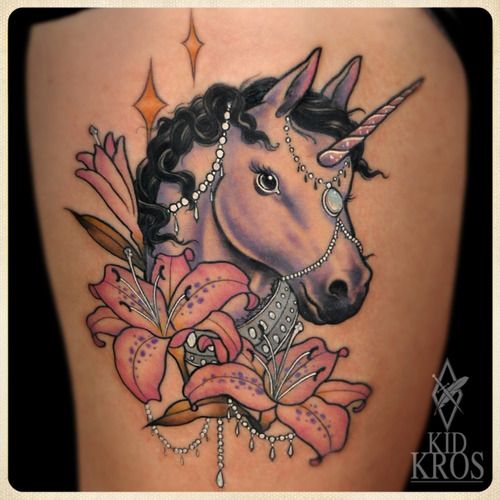 Crazy looking unicorn tattoo