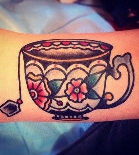 Cute teacup tattoo by Nick Oaks