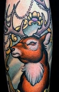 Deer frame tattoo by W. T. Norbert