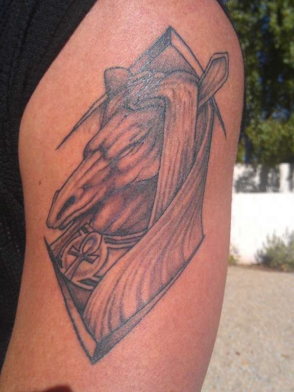 Egyptian god arm tattoo