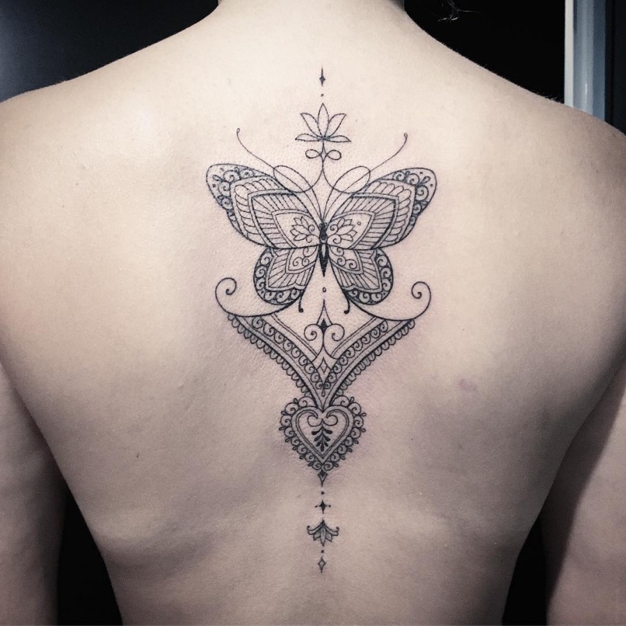 exquisite back butterfly tattoo by miltonreistatuador