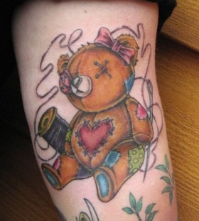 Fixed teddy bear tattoo