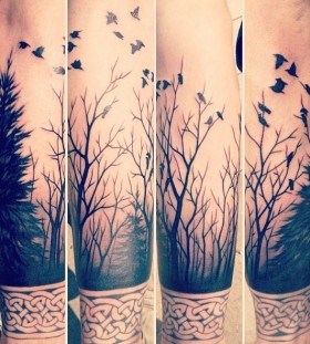 Forest, trees and tribal bird tattoo