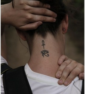 Girl's neck egyptian eye tattoo