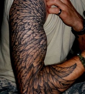 Great shoulder tribal bird tattoo