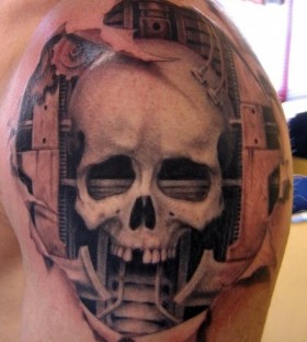 Great skull tattoo by Xavier Garcia Boix