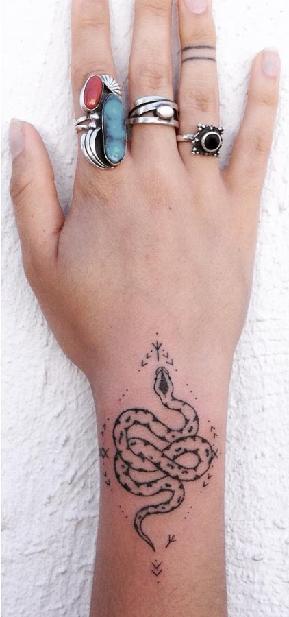 handpoked python tattoo by taticompton