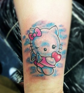 Hello kitty with wings tattoo