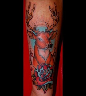 Incredible deer tattoo by W. T. Norbert
