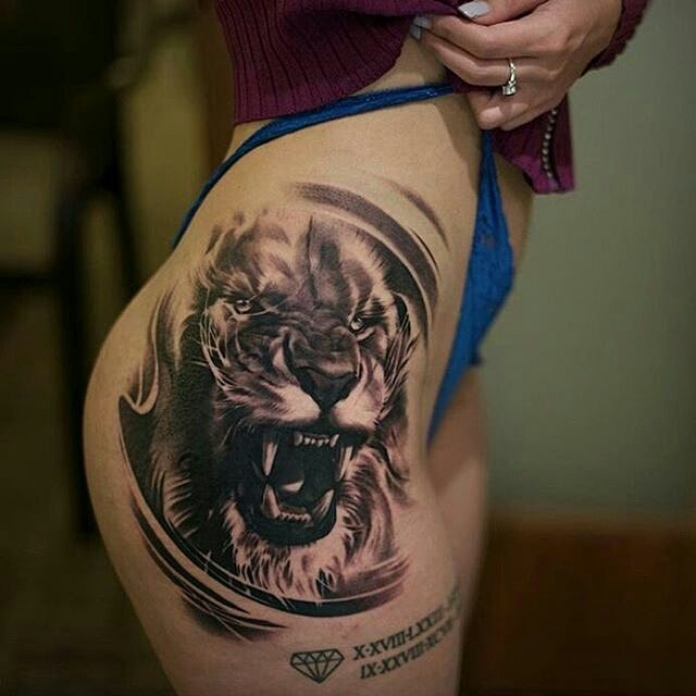 lion tattoo by charles saucier