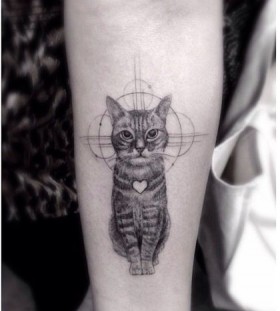 Lovely cat tattoo by Dr Woo