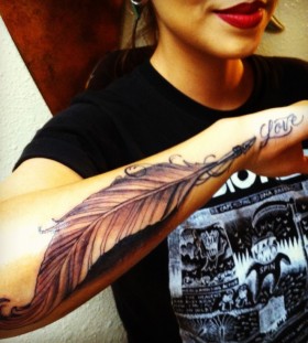 Lovely feather pen tattoo