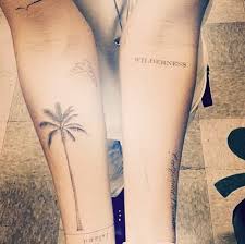 Lovely palm tree arm tattoo