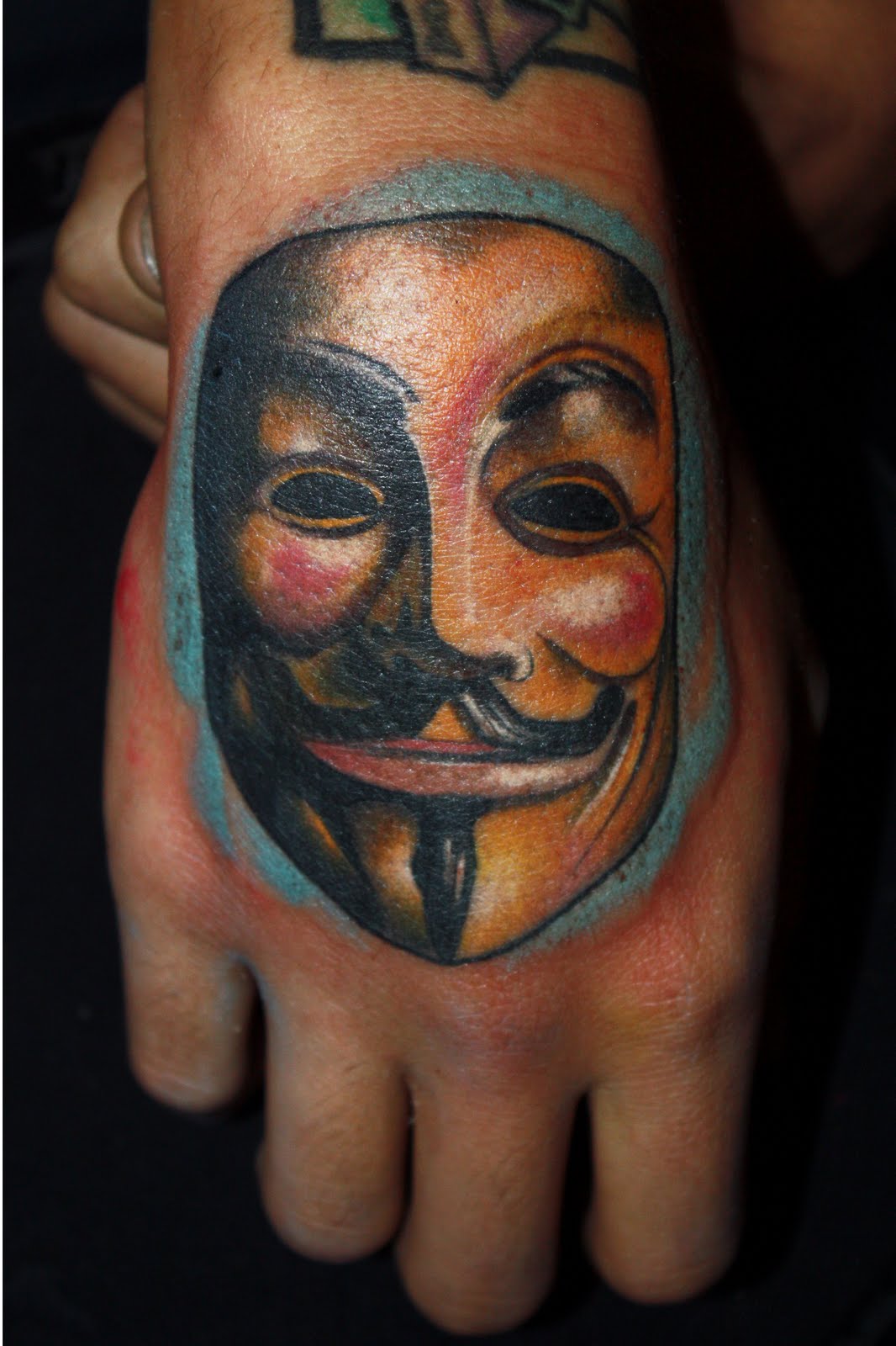Posted in gallery: V for Vendetta tattoos.