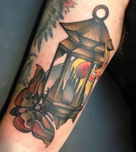 Moth and lantern tattoo by Amanda Leadman