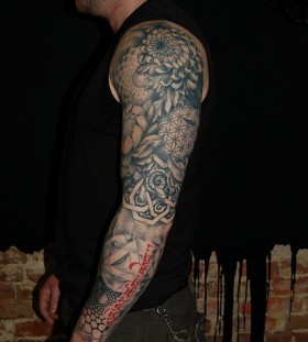 Nice full arm tattoo by David Allen
