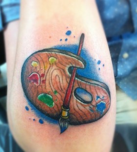 Paint brush and palette tattoo