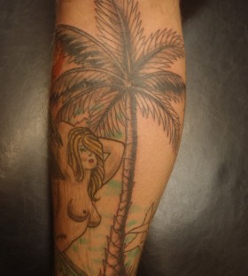 Palm tree and girl tattoo