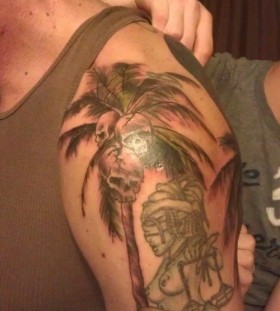 Palm tree with skulls tattoo