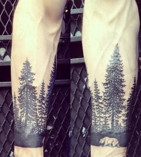 Pine trees and bear tattoo