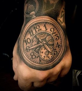 Pocket watch hand tattoo