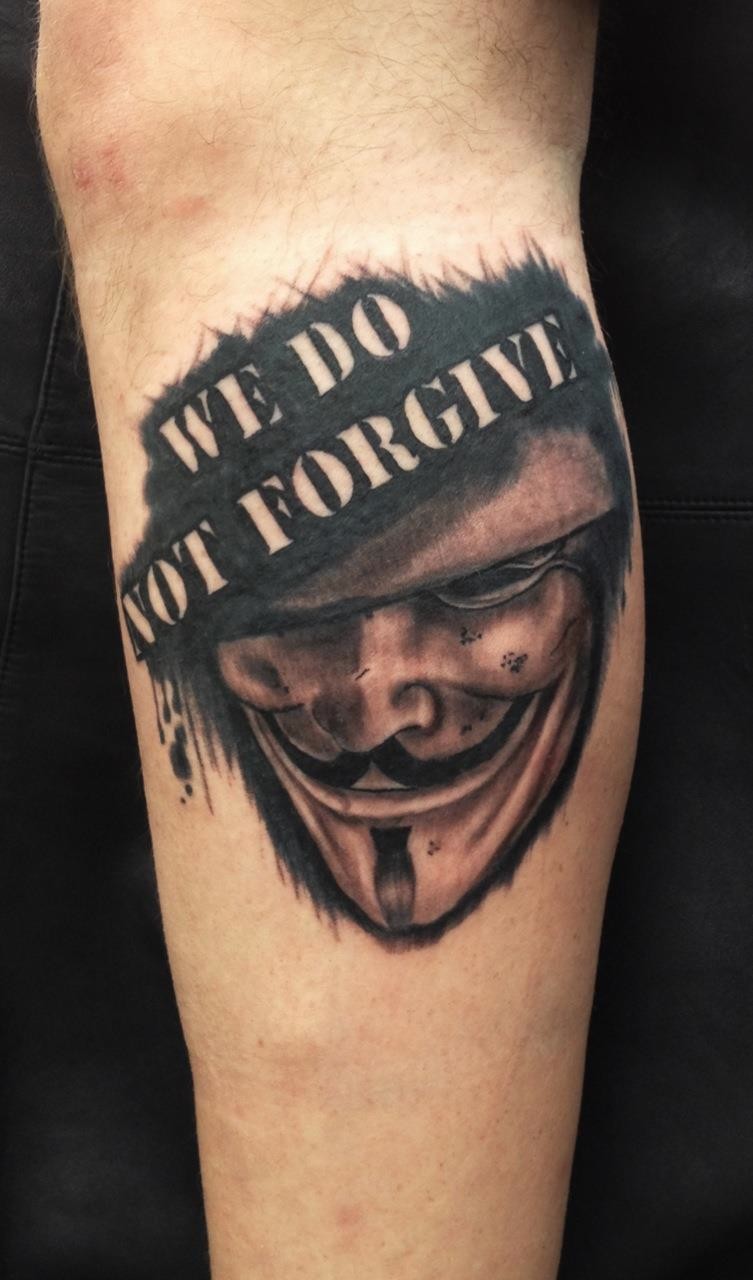 Quote-and-mask-of-V-tattoo.jpg