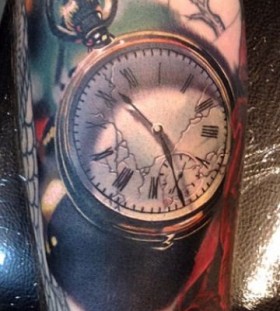 Realistic pocket watch tattoo by Phil Garcia