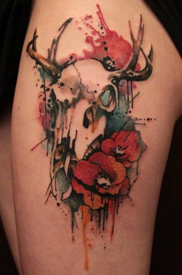 Skull and flower watercolor tattoo