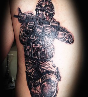 Soldier with a gun tattoo
