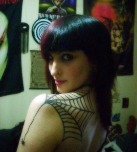 Spider web back tattoo