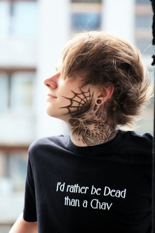 Spiderweb face tattoo