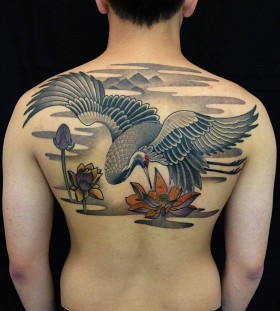 Stunning crane back tattoo