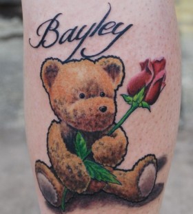 Teddy bear with rose tattoo