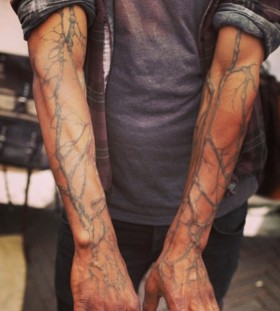 Tree branch full arm tattoo