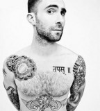 Adam Levine Sun and Flower Tattoo on Right Chest