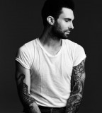 Adam Levine Tiger Tattoo In His RIght Arm
