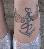 Pretty Wing and Anchor Themed Tattoo Design for Girls