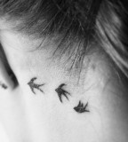 Black Bird Behind Ear Tattoo