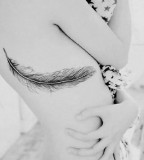 Angel Feather Tattoo Design on Side for Girls (NSFW)