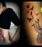 Feather Tattoo Design on Ribs for Women