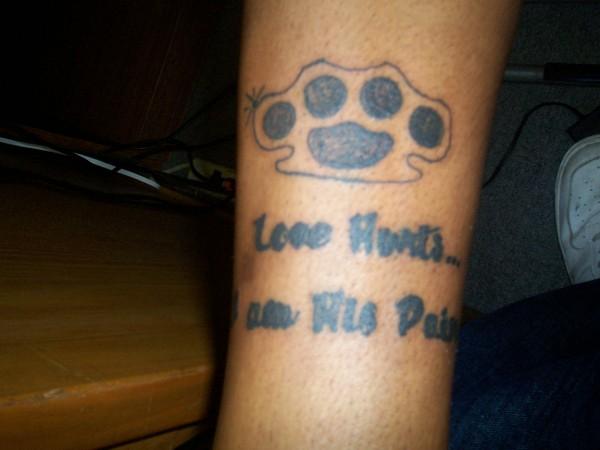 Love Hurts Brass Knuckles Tattoo