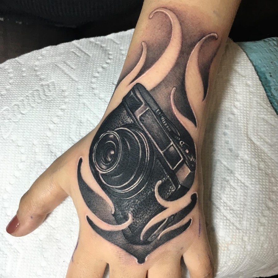 camera-hand-tattoo-by-megan_massacre