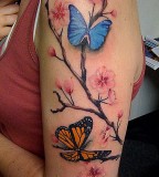 Cherry Blossom Tattoo with Blue and Orange Butterfly