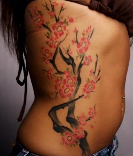Hannah Erin Cherry Blossom Rib Tattoo